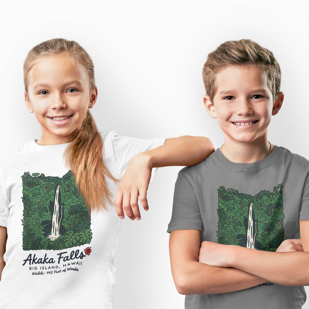 On-model lifestyle photo of the Akaka Falls Big Island Hawaii Vintage Travel Graphic Kids Hawaiian T-shirt