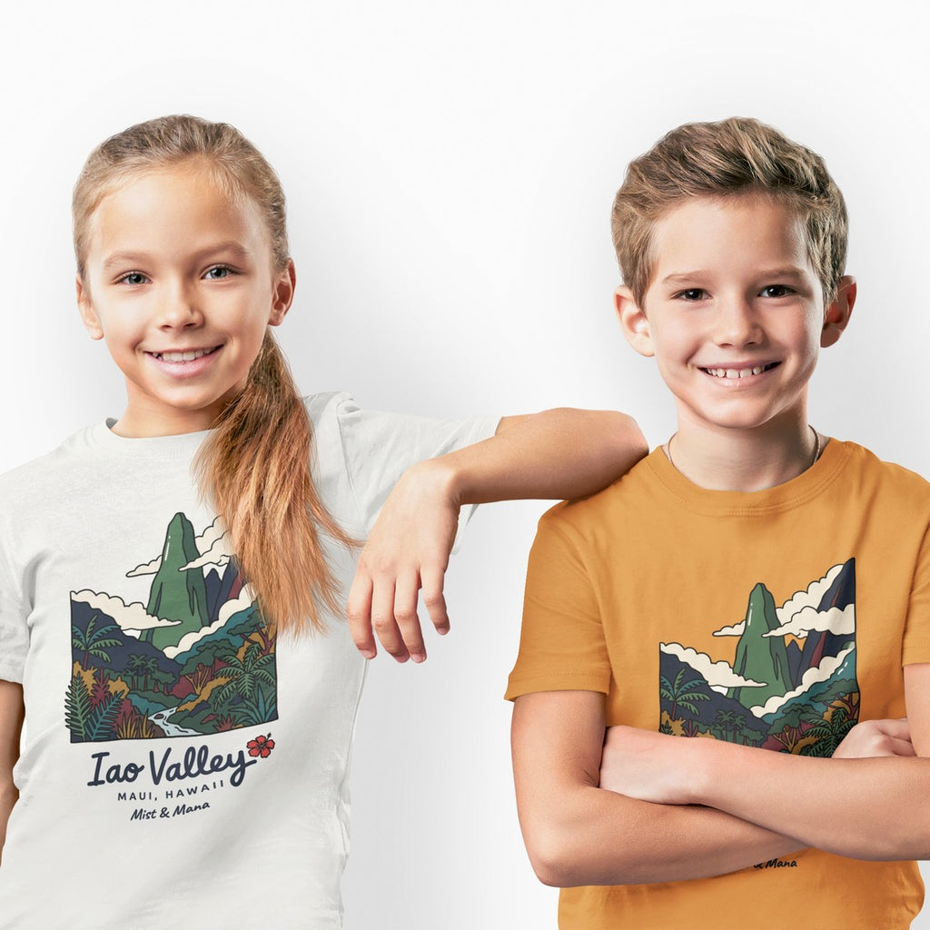 On-model lifestyle photo of the Iao Valley Maui Hawaii Vintage Travel Graphic Kids Hawaiian T-shirt