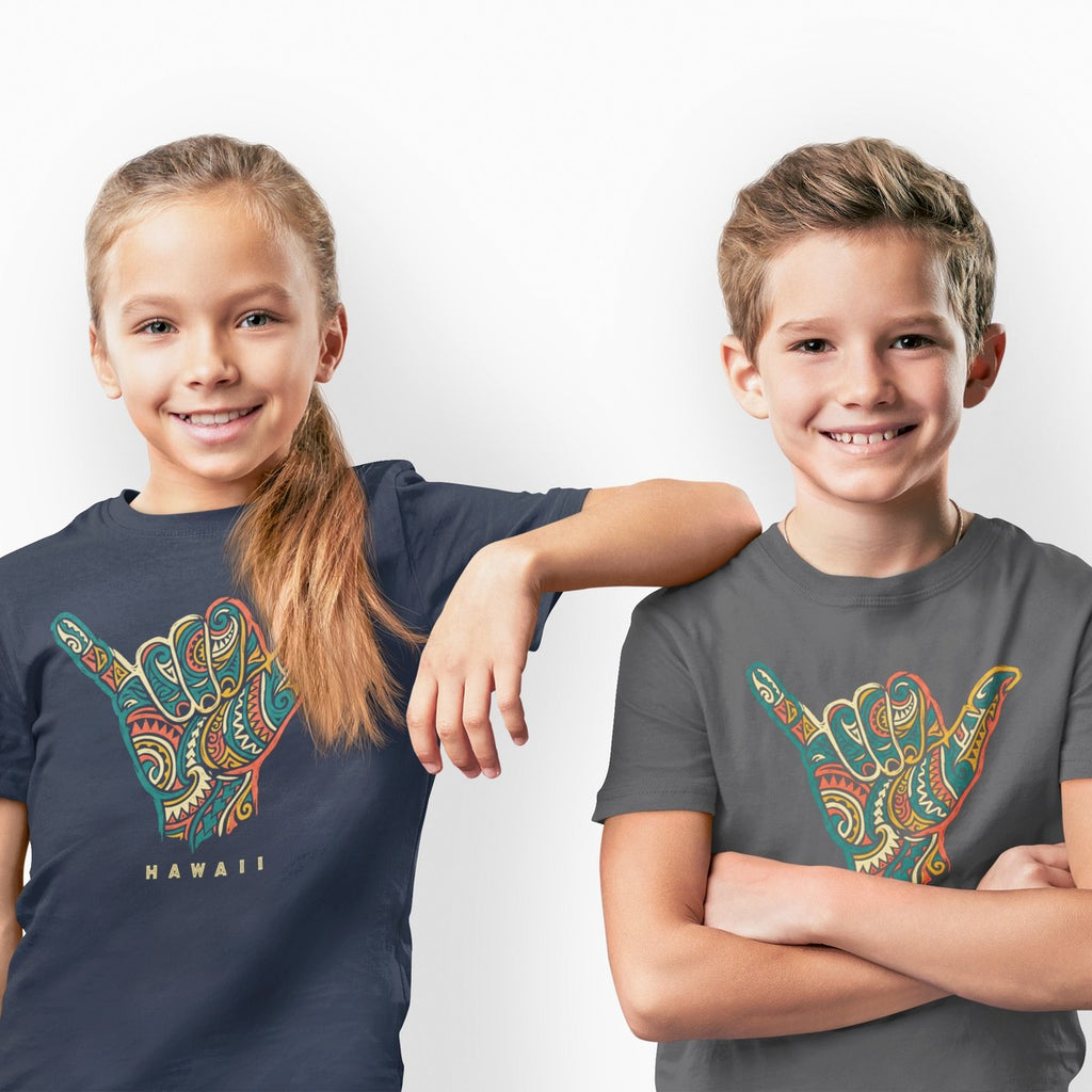 On-model lifestyle photo of the Shaka Hand Hawaiian Tribal Aloha Graphic Kids Hawaiian T-shirt