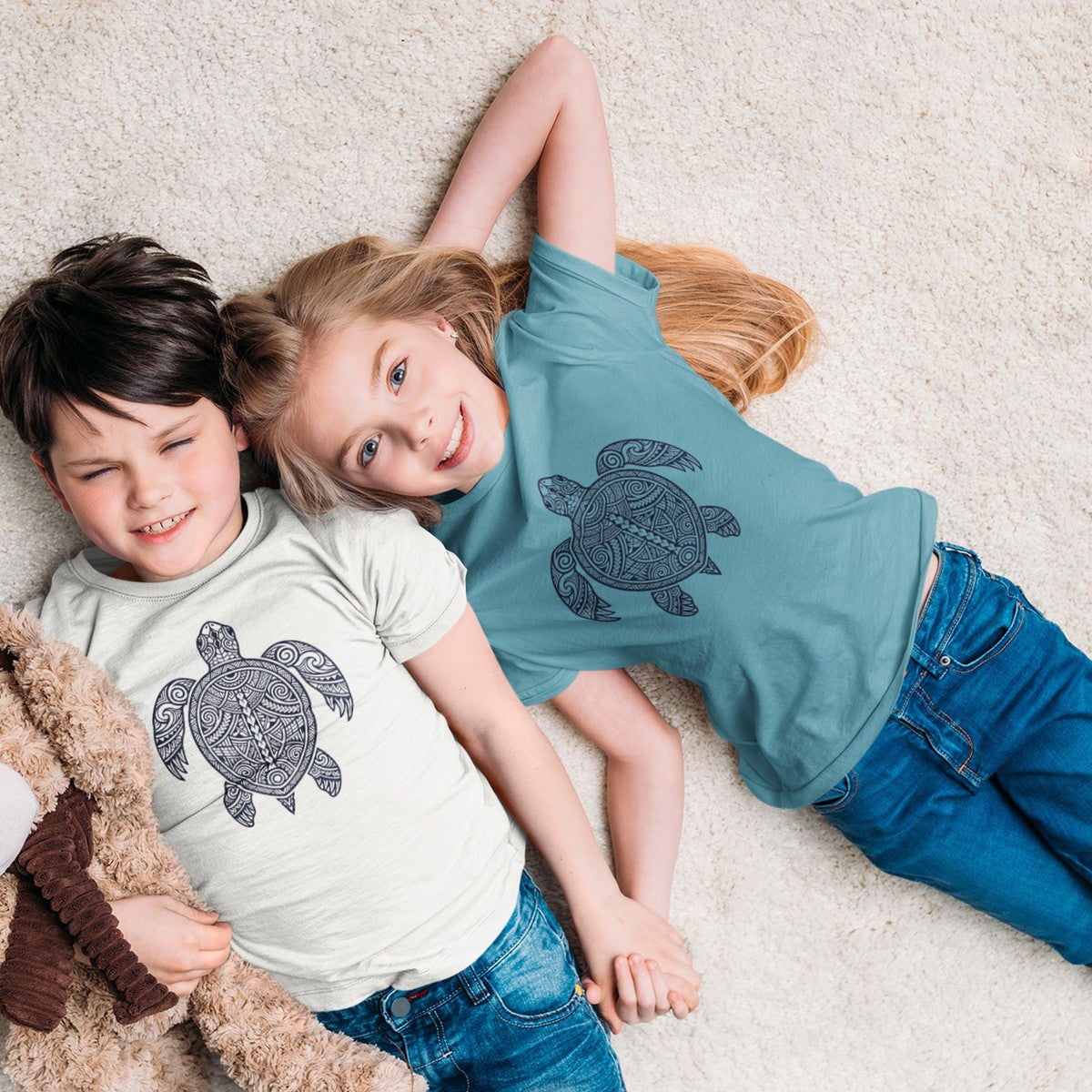 On-model lifestyle photo of the Polynesian Tribal Sea Turtle Honu Hawaiian Graphic Kids Hawaiian T-shirt