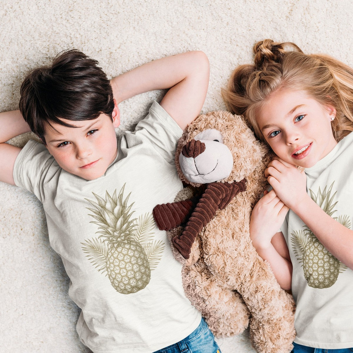On-model lifestyle photo of the Vintage Pineapple Engraving Hawaii Tropical Kids Hawaiian T-shirt
