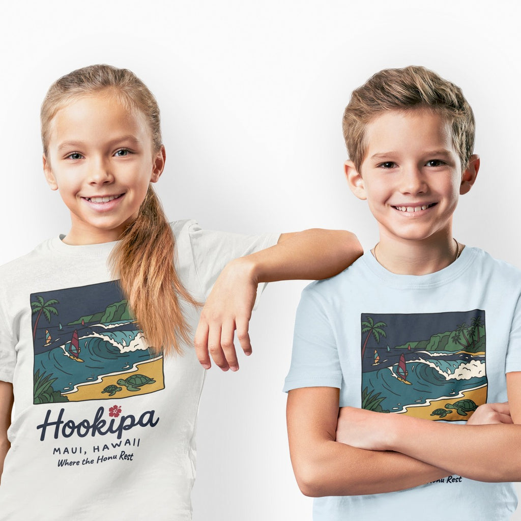 On-model lifestyle photo of the Hookipa Beach Maui Hawaii Vintage Travel Graphic Kids Hawaiian T-shirt
