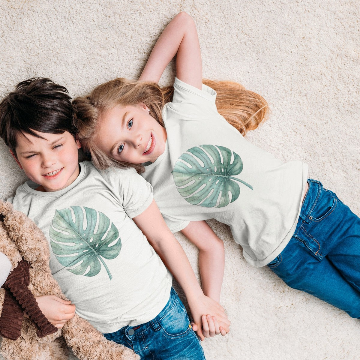 On-model lifestyle photo of the Monstera Leaf Tropical Hawaiian Botanical Kids Hawaiian T-shirt