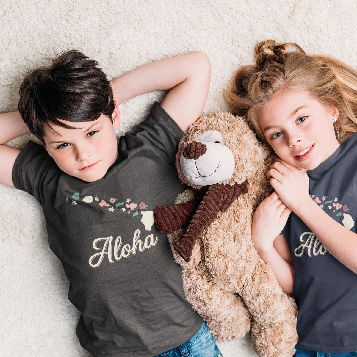 On-model lifestyle photo of the Hawaii Aloha Islands Minimalist Map Kids Hawaiian T-shirt