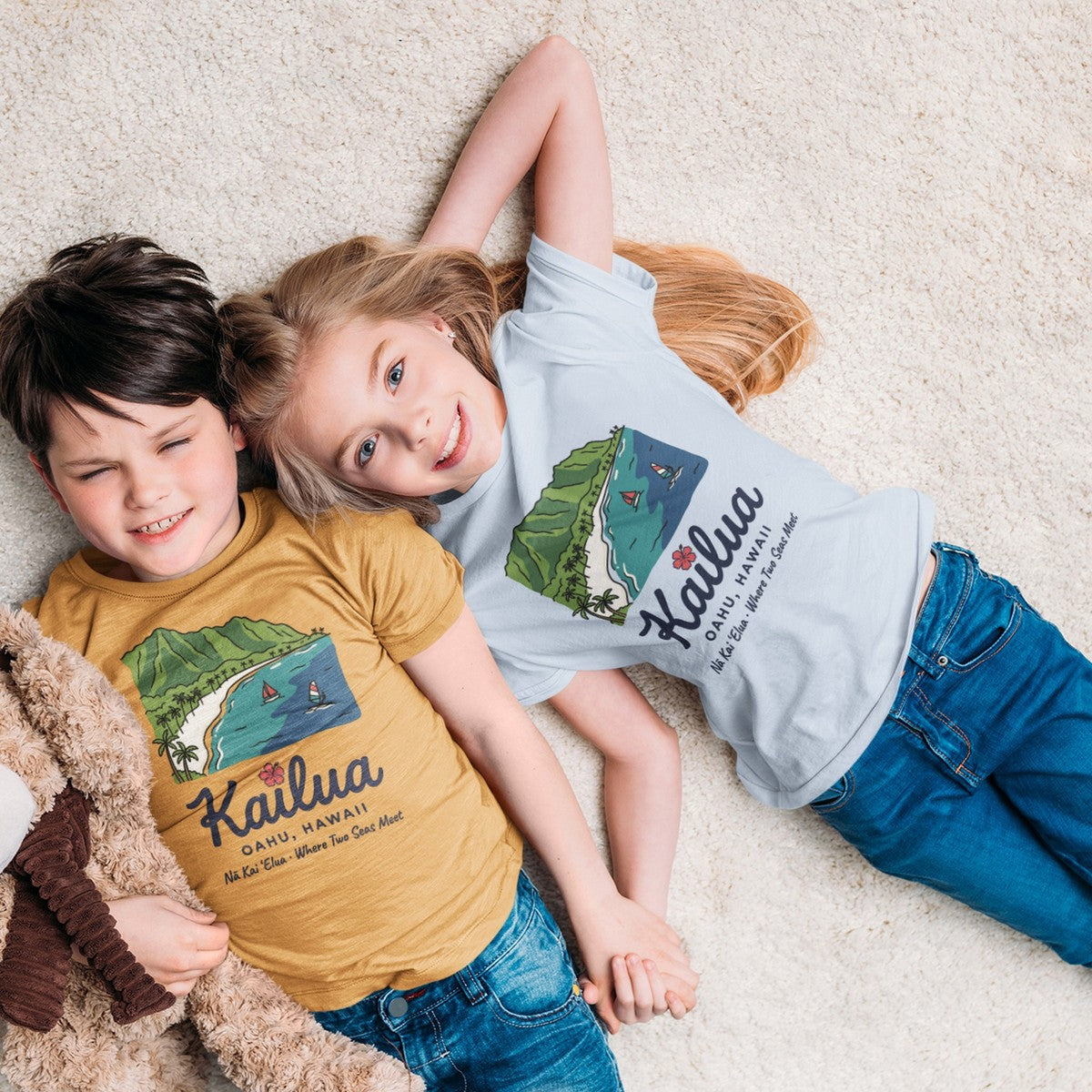 On-model lifestyle photo of the Kailua Beach Oahu Hawaii Vintage Travel Graphic Kids Hawaiian T-shirt