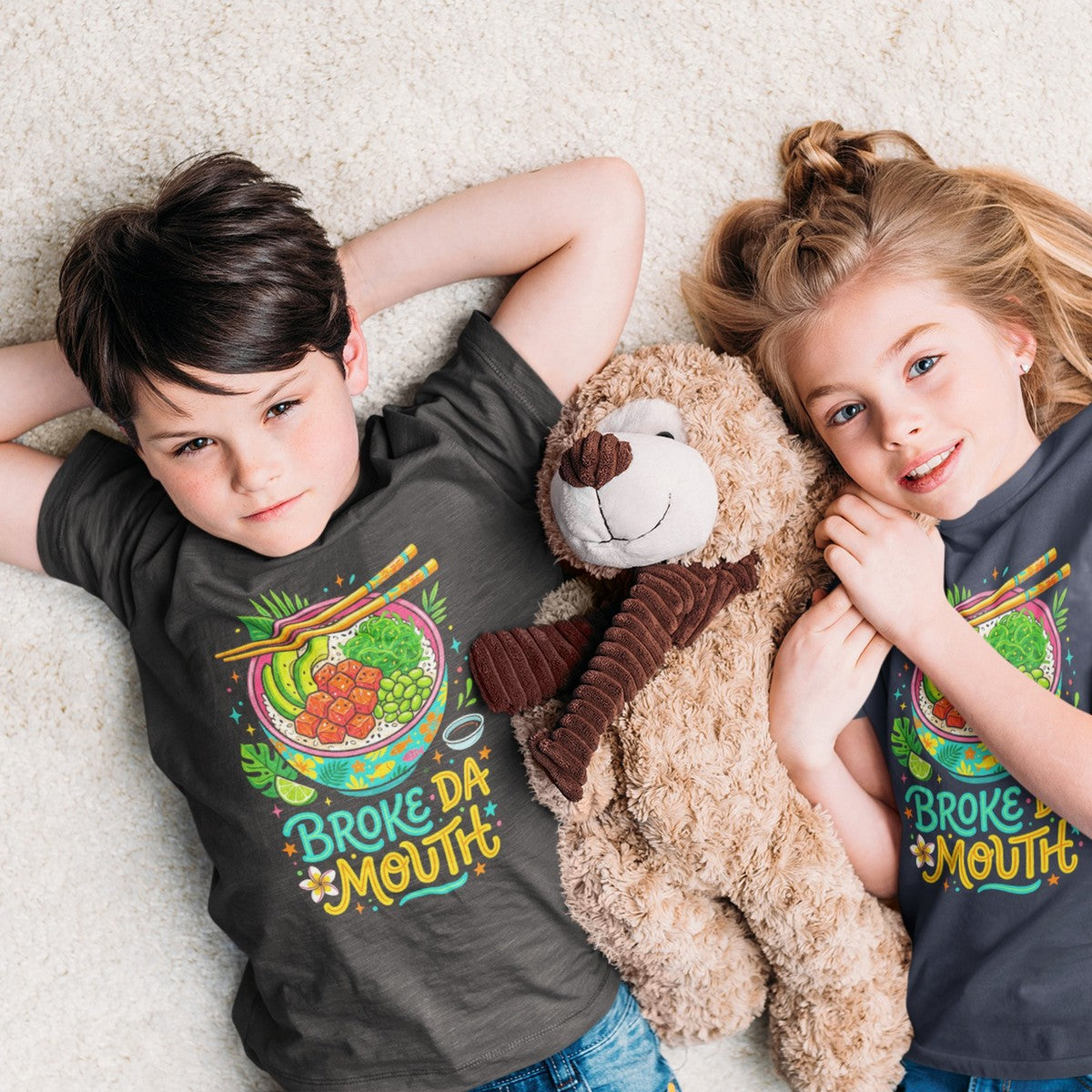 On-model lifestyle photo of the Broke Da Mouth Hawaii Poke Bowl Foodie Kids Hawaiian T-shirt