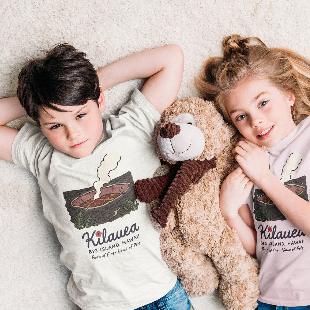 On-model lifestyle photo of the Kilauea Volcano Big Island Hawaii Vintage Travel Graphic Kids Hawaiian T-shirt