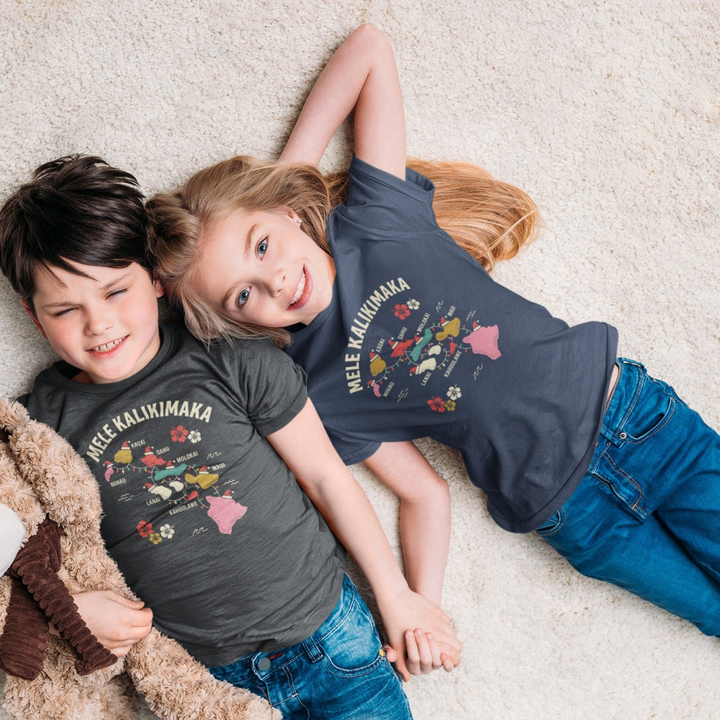On-model lifestyle photo of the Hawaiian Islands Christmas Map Hawaiian Christmas Kids Hawaiian T-shirt
